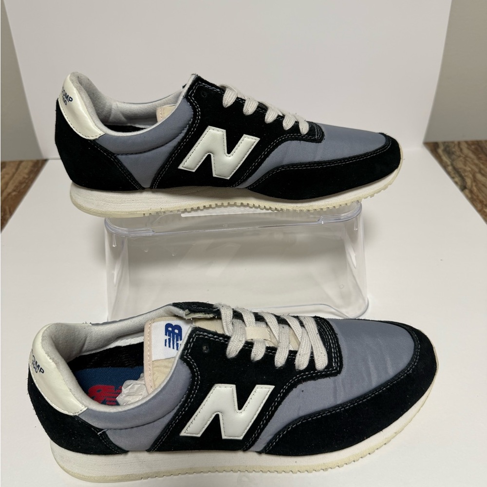 New Balance Men's Black and White Sneakers